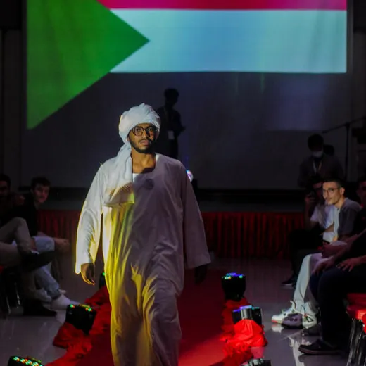 Traditional Sudanese dress on stage at a cultural night